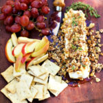 goat cheese log with apples and grapes