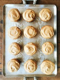 tray with 12 zucchini cupcakes with maple frosting