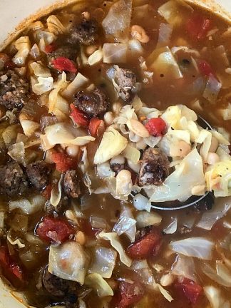 White Bean Cabbage Sausage Soup at ReluctantEntertainer.com