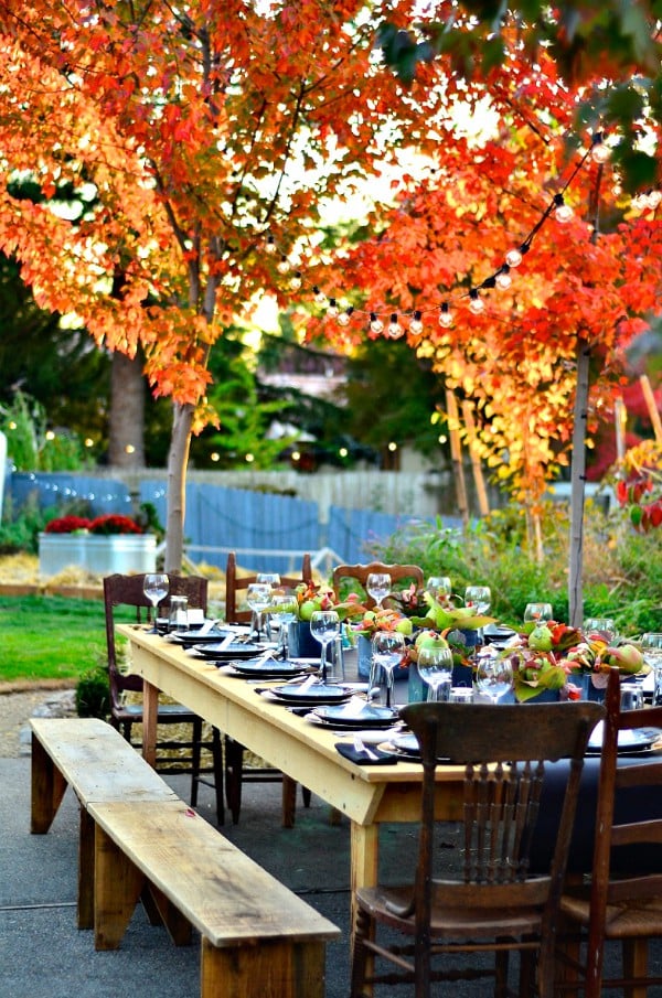 fall tablescape decorated with pears (setting for 14)