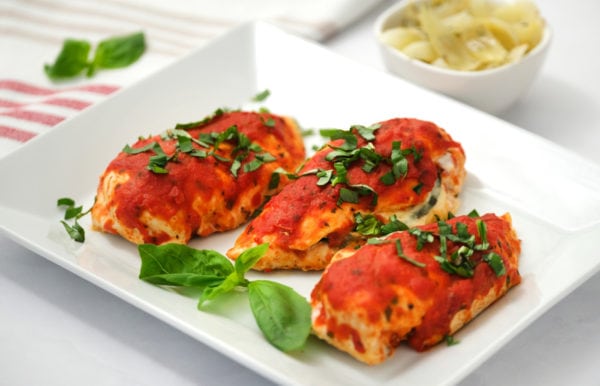3 cooked chicken breasts with marinara