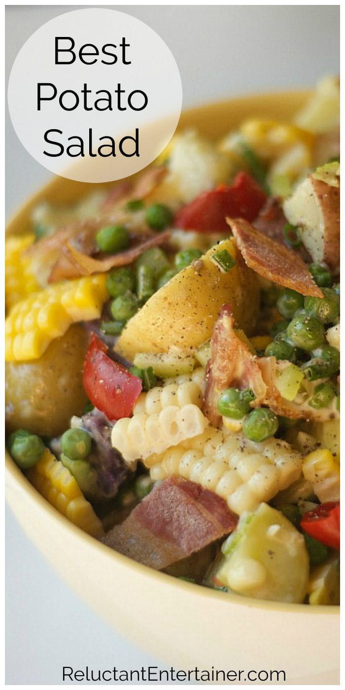 close up of potato salad with fingerling potatoes, bacon, corn, and peas