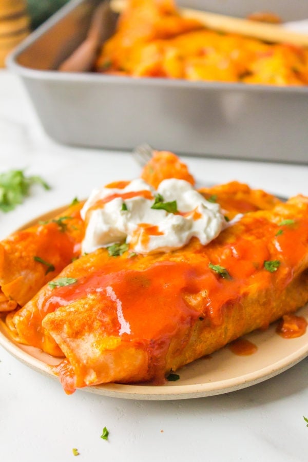 2 enchiladas on a plate