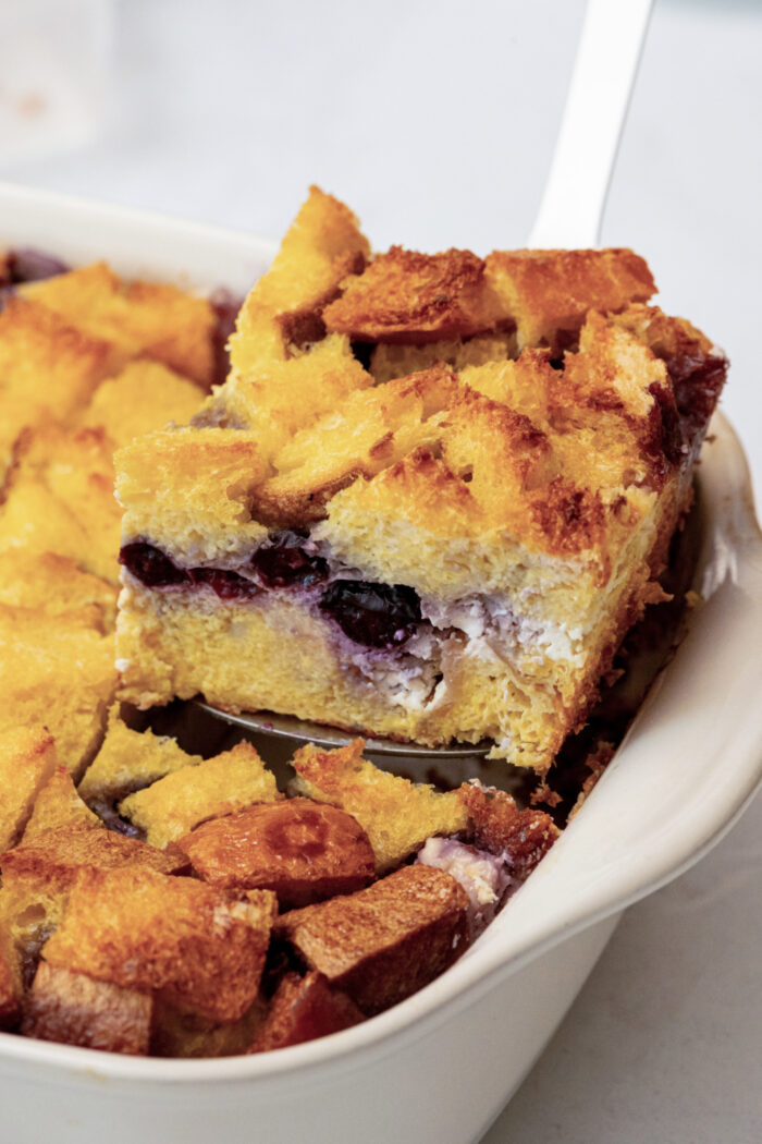 serving a piece of Blueberry French Toast casserole