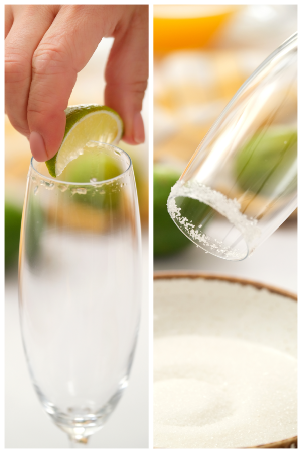 adding sugar and lime to rim of glass