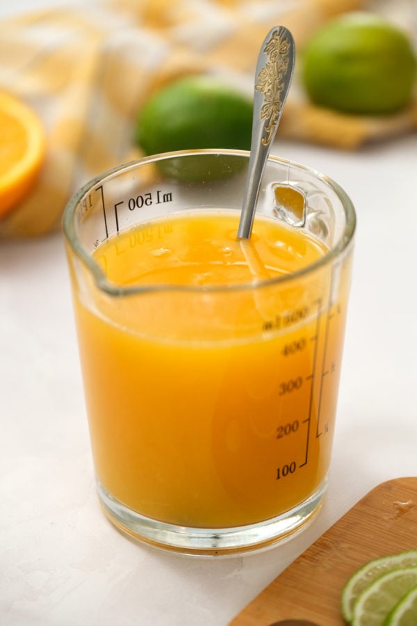 stirring orange juice