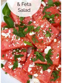 plate of sliced watermelon with feta cheese and mint