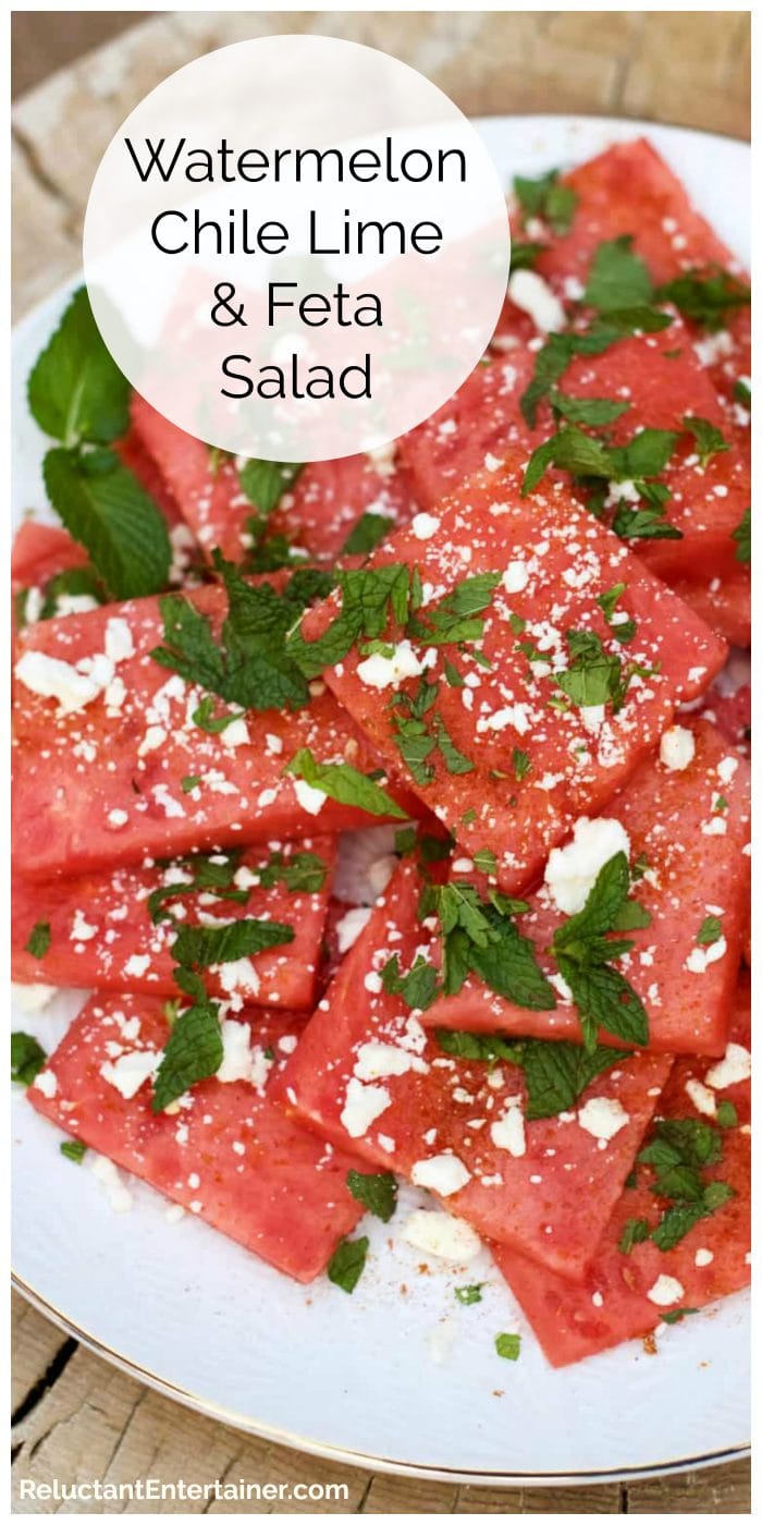 plate of sliced watermelon with feta cheese and mint