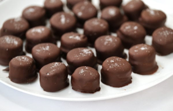 a plate of frozen chocolate covered banana bites