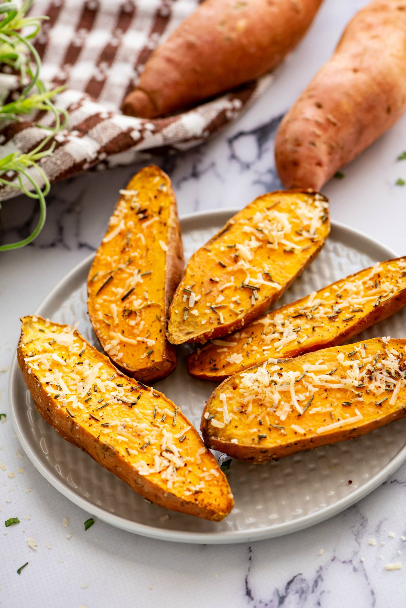 https://reluctantentertainer.com/wp-content/uploads/2017/10/Roasted-Sweet-Potatoes-with-Rosemary-3.jpg