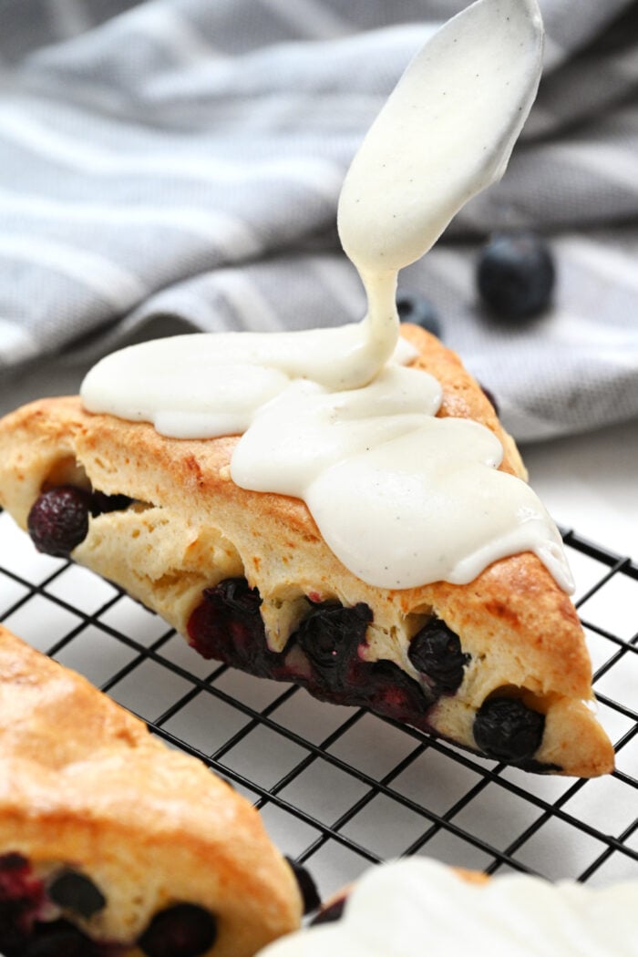 adding icing to a scone