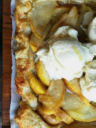 square puff pastry with pear filling and scoop of ice cream