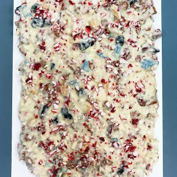 slab of White Chocolate Peppermint Bark on a white plate