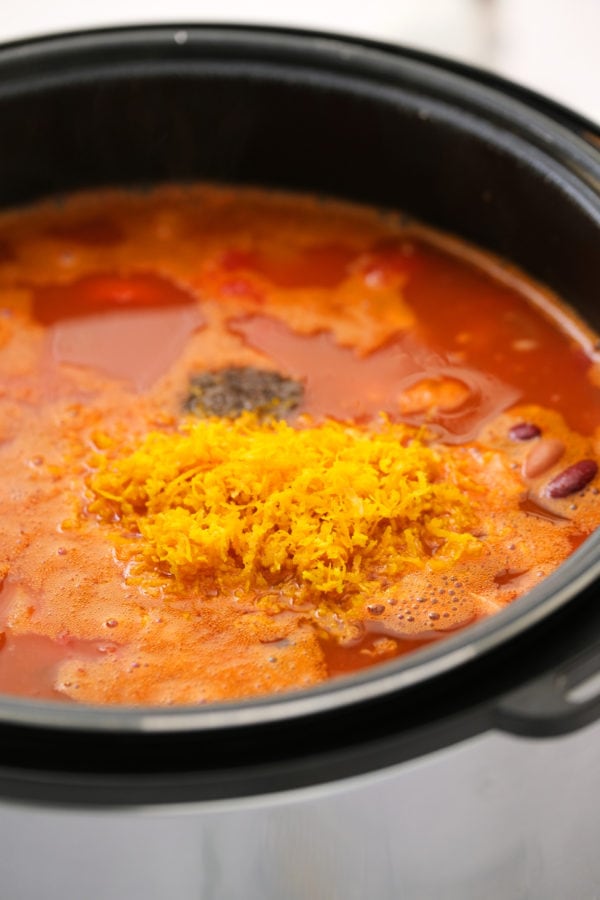 adding orange zest to Instant Pot Mango Chicken Chili