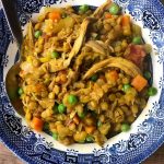 Chicken Curry Crock Pot Lentil Soup in a blue soup bowl