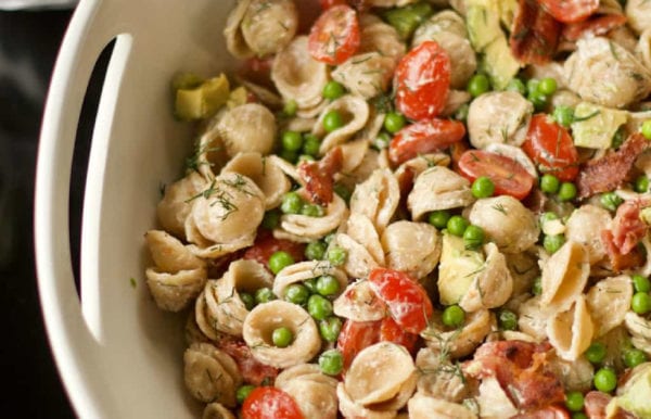 a bowl of pasta salad with BLT ingredients