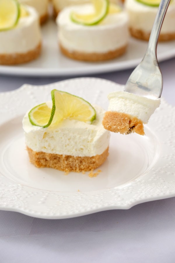 bite of Mini Margarita Cheesecake on a white plate