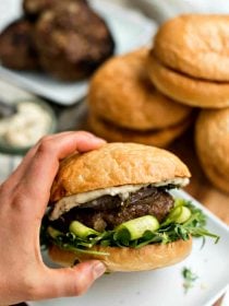 mint and lamb burger with fig jam on a toasted bun
