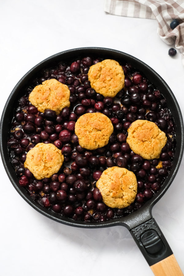skillet blueberry cobbler with cookies on top