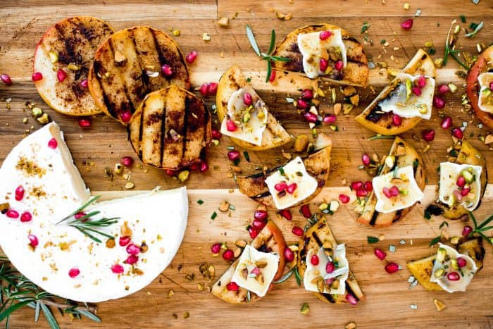 https://reluctantentertainer.com/wp-content/uploads/2018/09/Grilled-Apple-Pistachio-Pomegranate-Brie-Bites-3-700x467.jpg