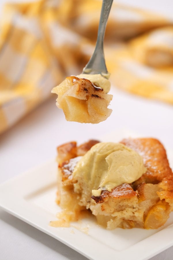 taking a bite of pear cobbler