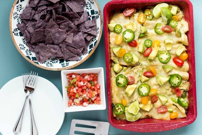 Tasty Zucchini Cheese Enchiladas Verde with blue corn chips