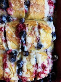 moist and fresh baked french toast with berries and mascarpone cheese