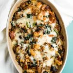 oval pan of cheesy mushroom bread pudding