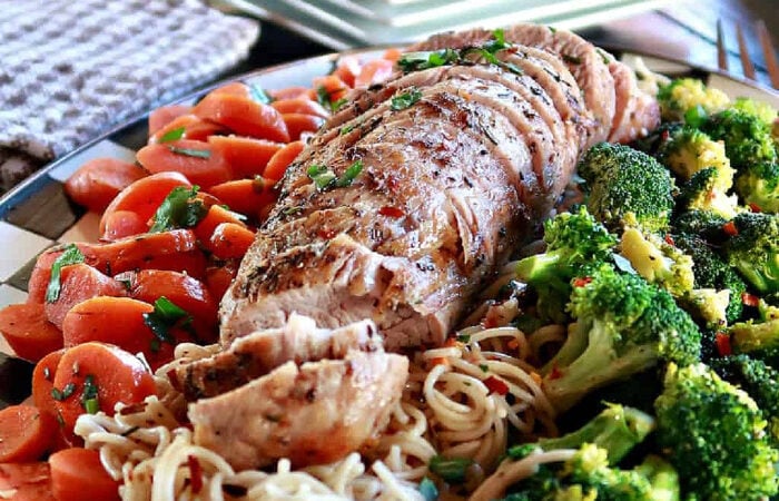 serving Rosemary Pork Tenderloin with broccoli