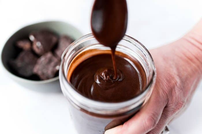 drizzle of Homemade Chocolate Sauce off of a spoon