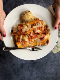 https://reluctantentertainer.com/wp-content/uploads/2019/02/Trader-Joes-Red-Sauce-Enchiladas-9-210x280.jpg