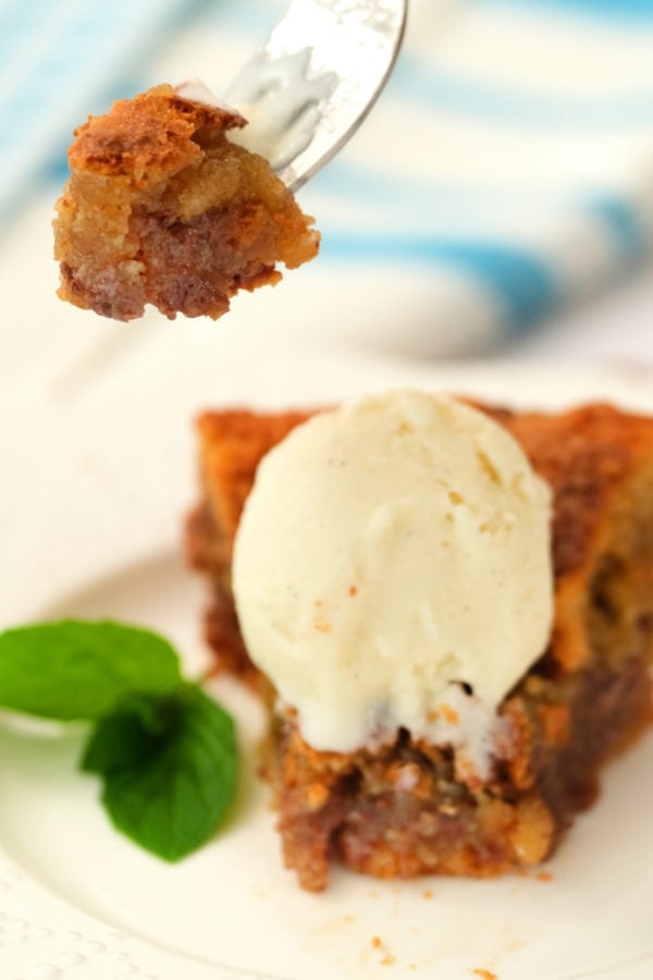 taking a bite of Crustless Gluten-Free Chocolate Chip Pie