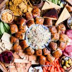 a big board with Irish sliders and charcuterie foods