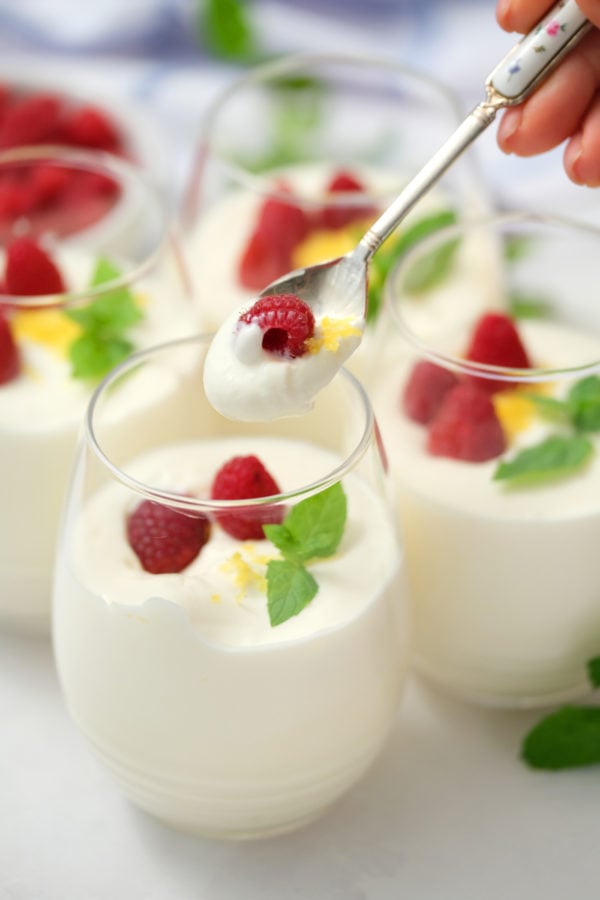 taking a bite of lemon cheesecake mousse