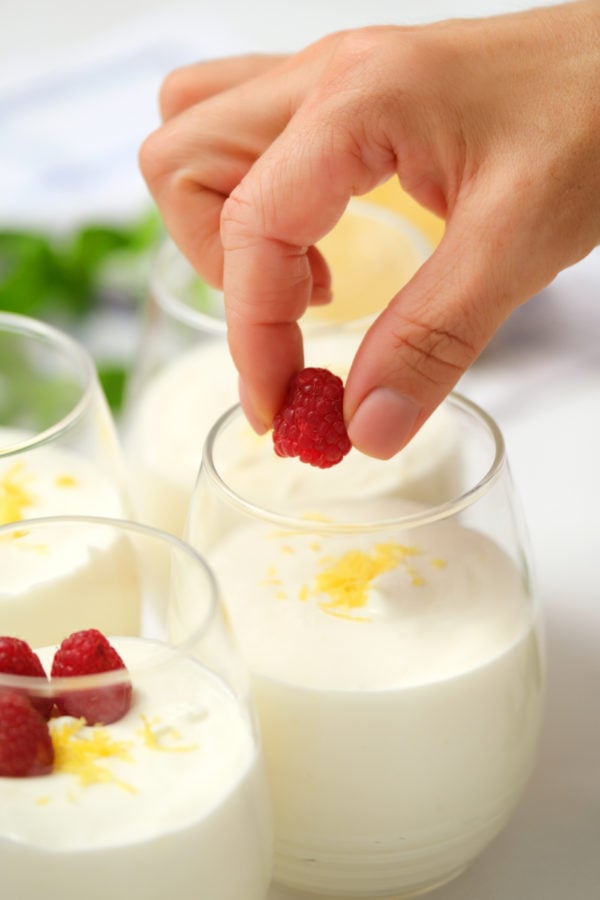 garnish a serving of lemon mousse with raspberry