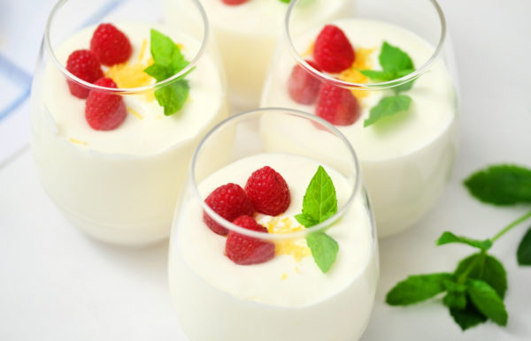 lemon cheesecake mousse with raspberries and mint