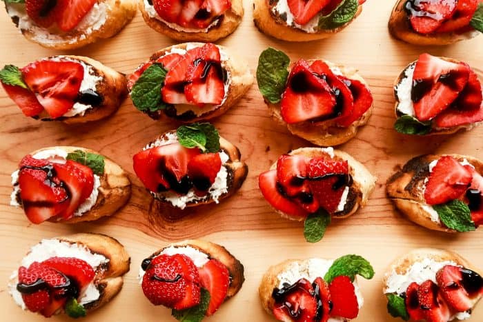 A platter of Strawberry Bruschetta with baslamic glaze