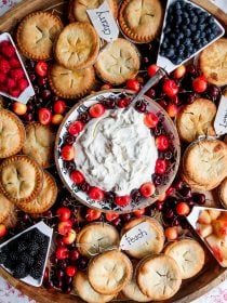 board with mini fruit pies