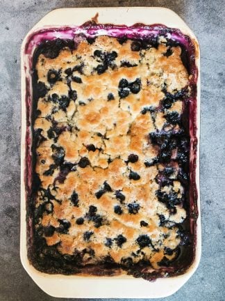 blueberry cobbler with a brown crusty topping