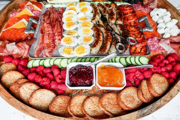eggs and meat on a charcuterie board