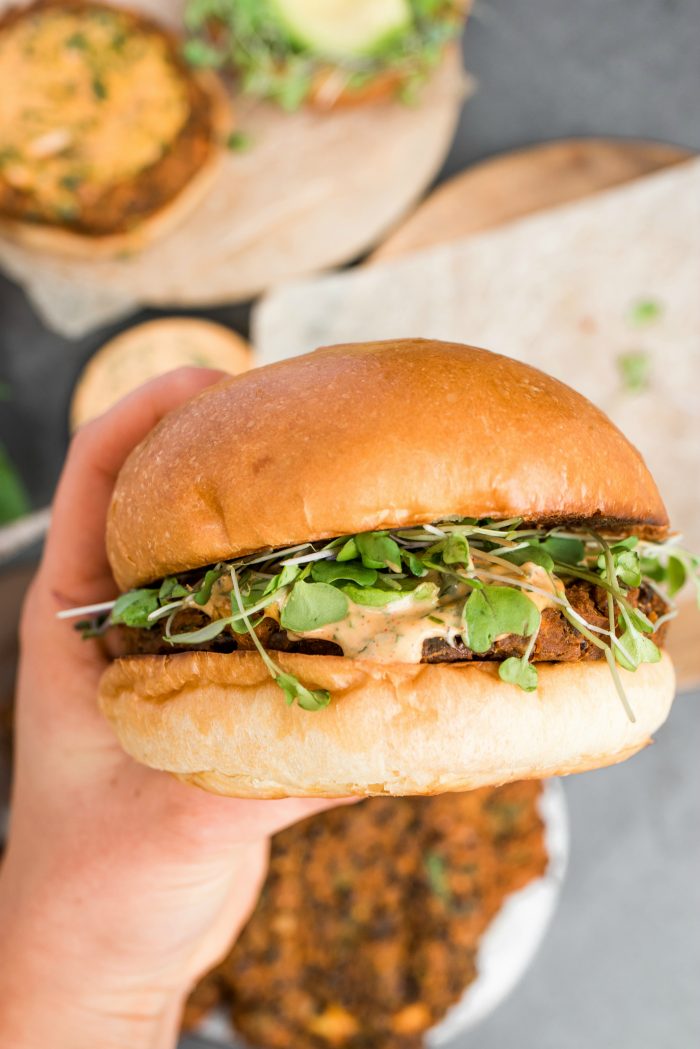 a bite of Sweet Potato Lentil Burgers