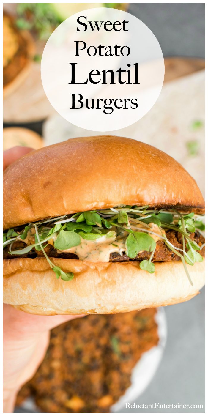 holding a sweet potato lentil burger