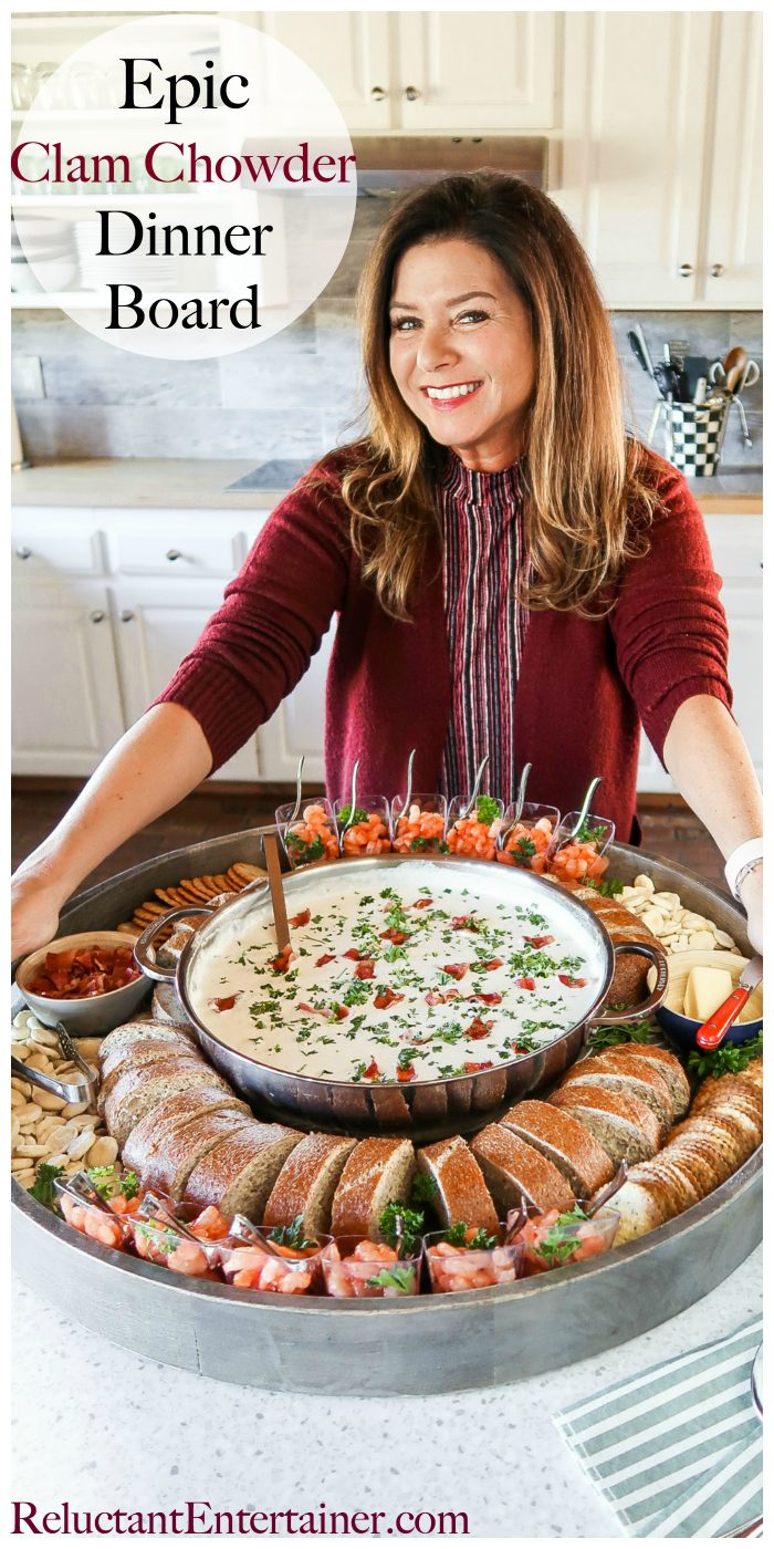 woman holding a Clam Chowder Dinner Board