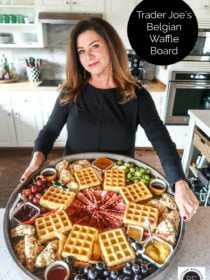 woman holding a large waffle board