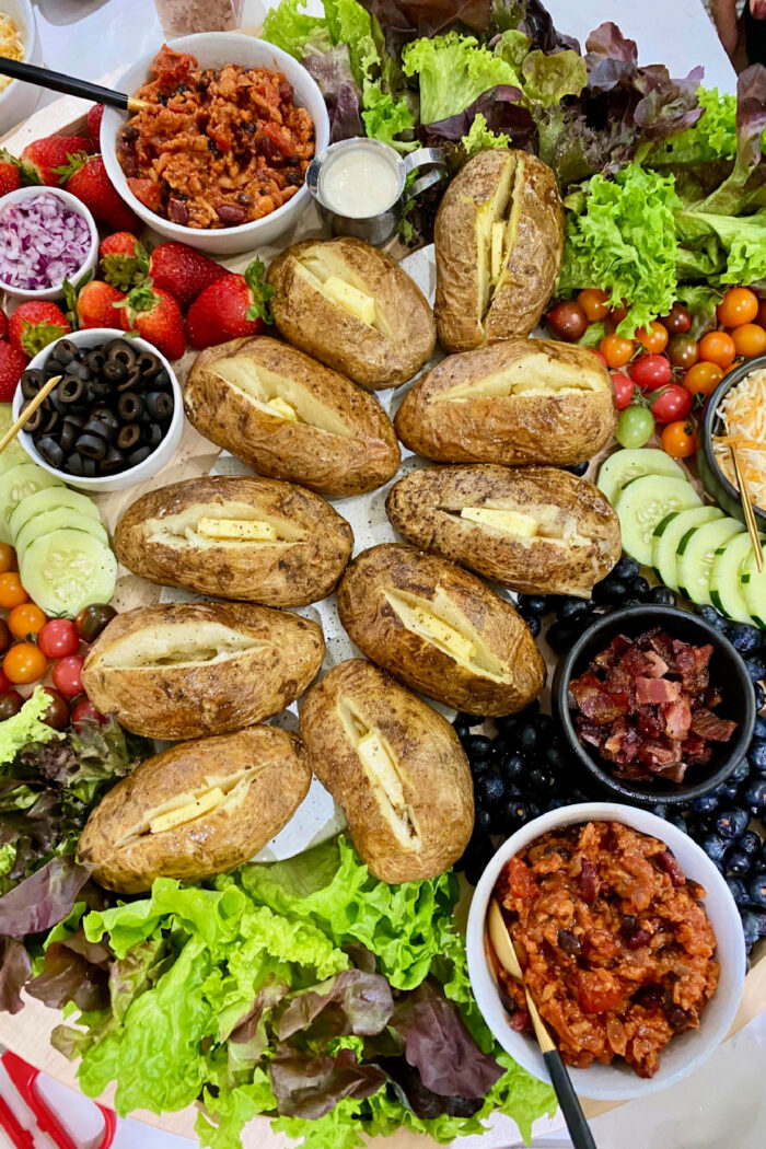 baked russet potatoes on potato bar