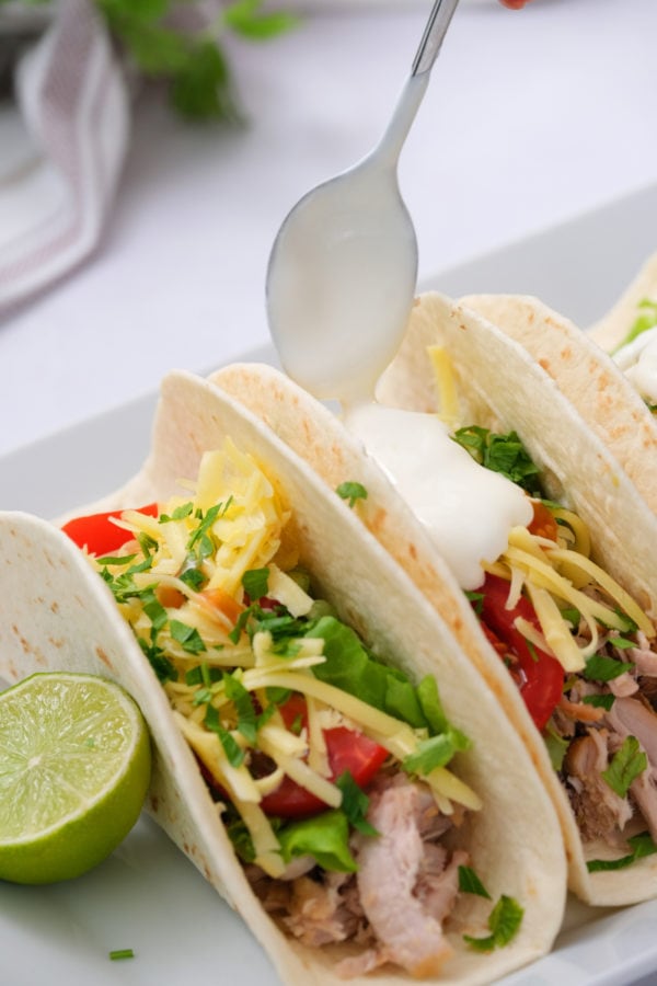 2-Ingredient Crock Pot Pork Verde tacos