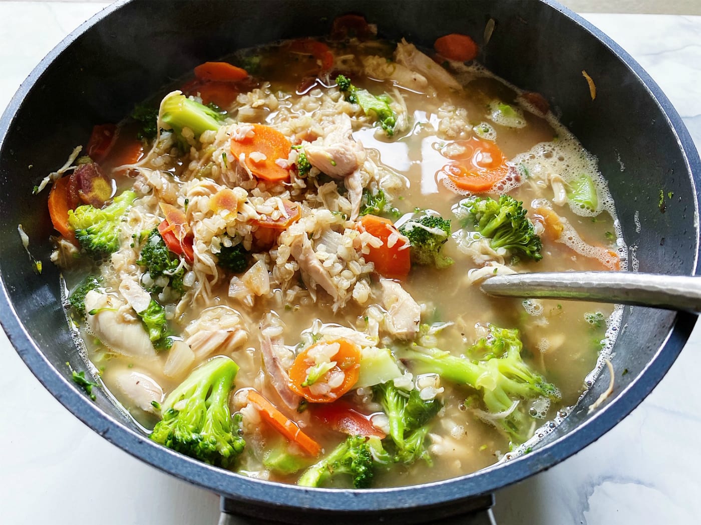 https://reluctantentertainer.com/wp-content/uploads/2020/04/healtyn-Broccoli-Chicken-Rice-Soup.jpg