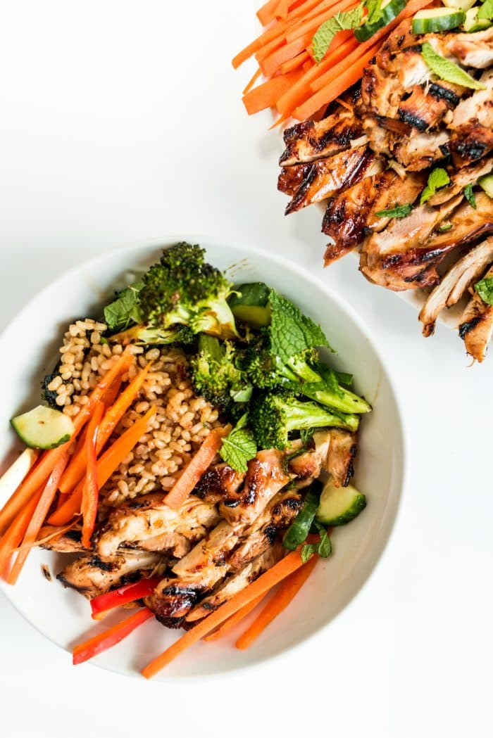 a bowl of rice and chicken and veggies