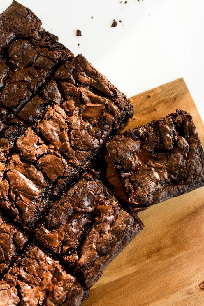 overview of brownies on a wood cutting board