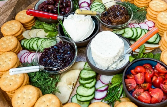 soft cheese on a cracker board